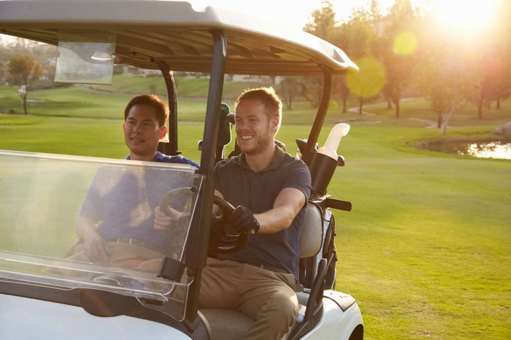 With the buggy over the golf course...