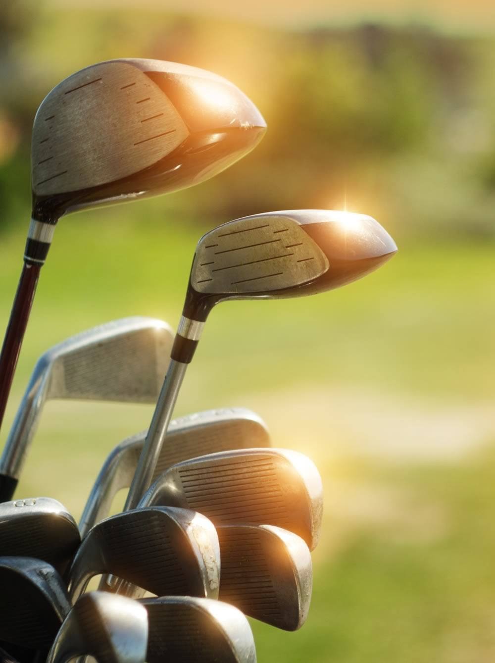 Golfers at sunrise at the golf course Zell am See-Kaprun-Saalbach-Hinterglemm width=